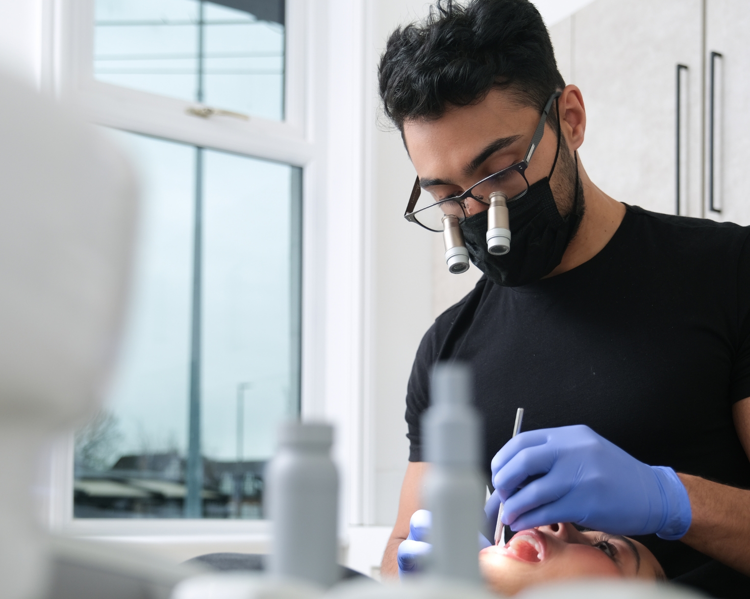 dentist performing treatment